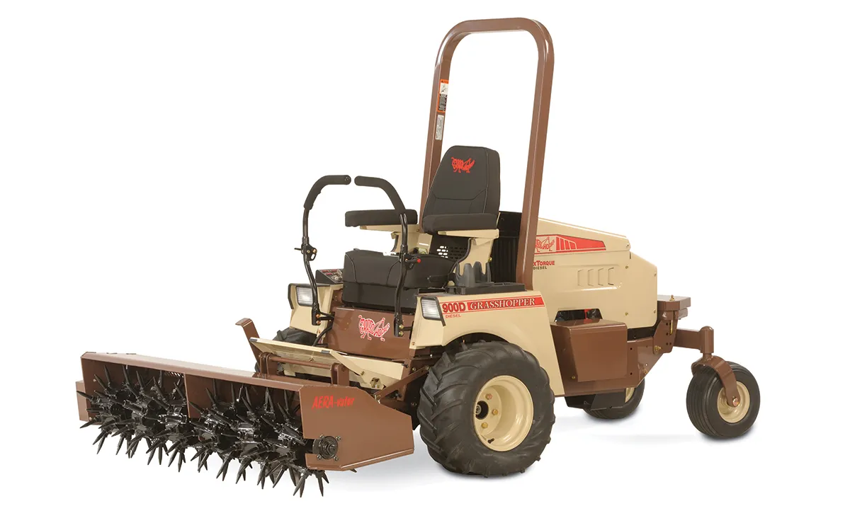 AeraVator Lawn mower attachment on a front mount grasshopper mower