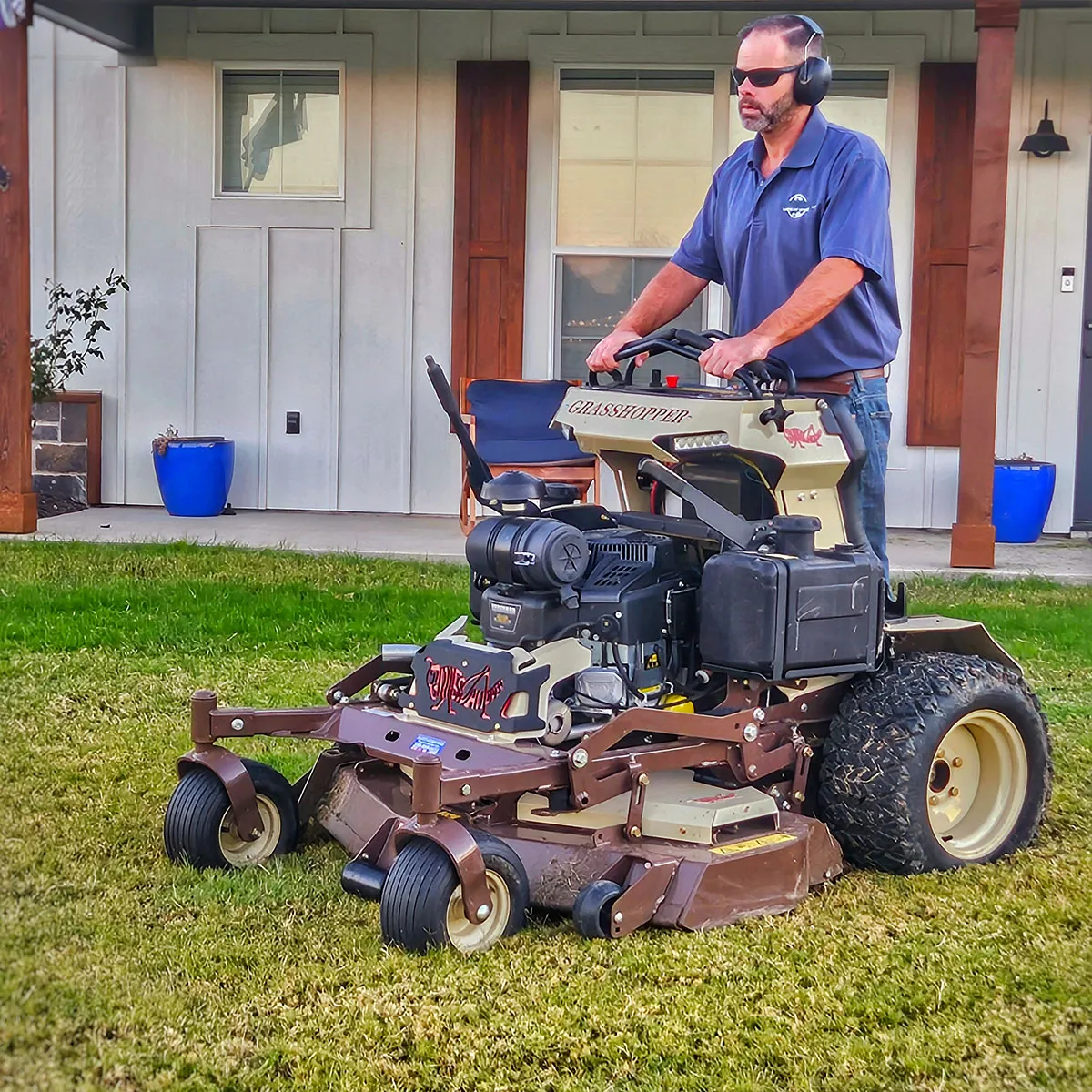 Customer Review Doug Lee with a Grasshopper zero-turn lawn mower