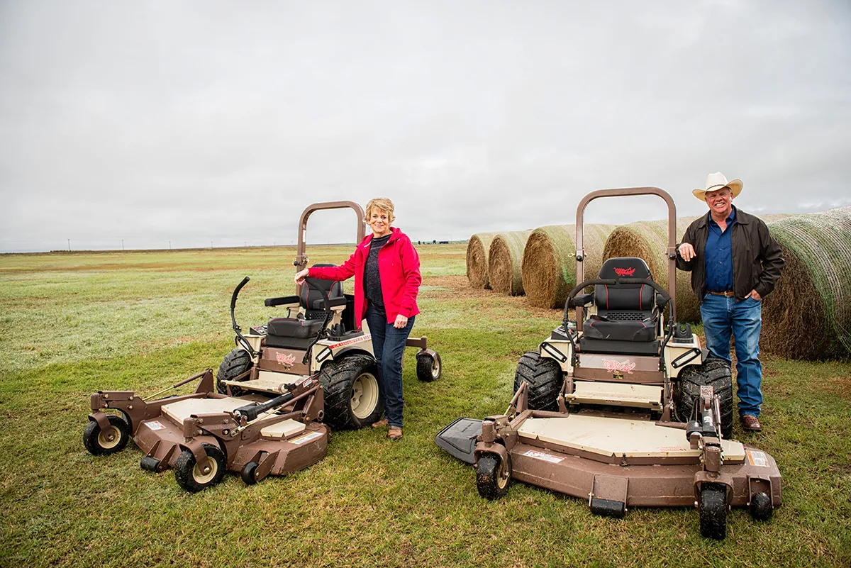 Farm Bureau Offer Image - two farmers using Grasshopper Mowers front mount zero turn mowers for large property