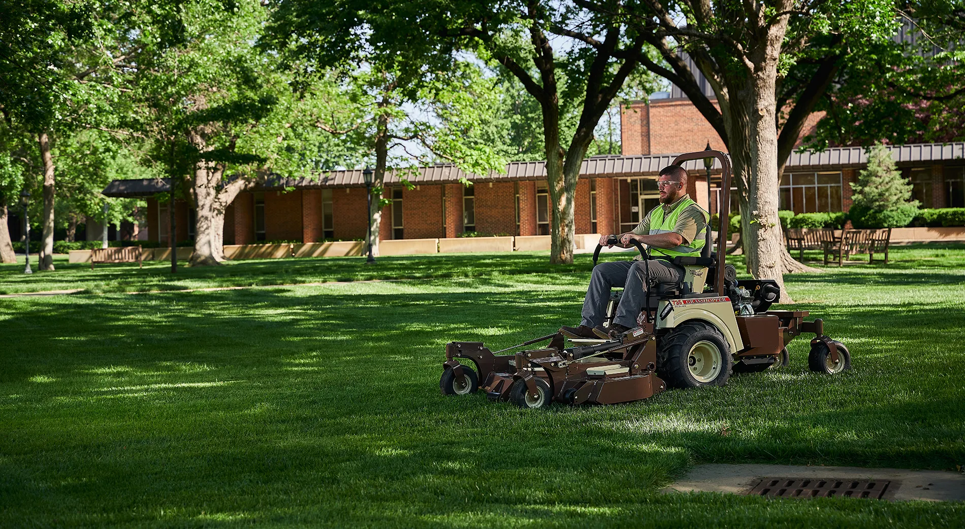 Government Mower mowing college property