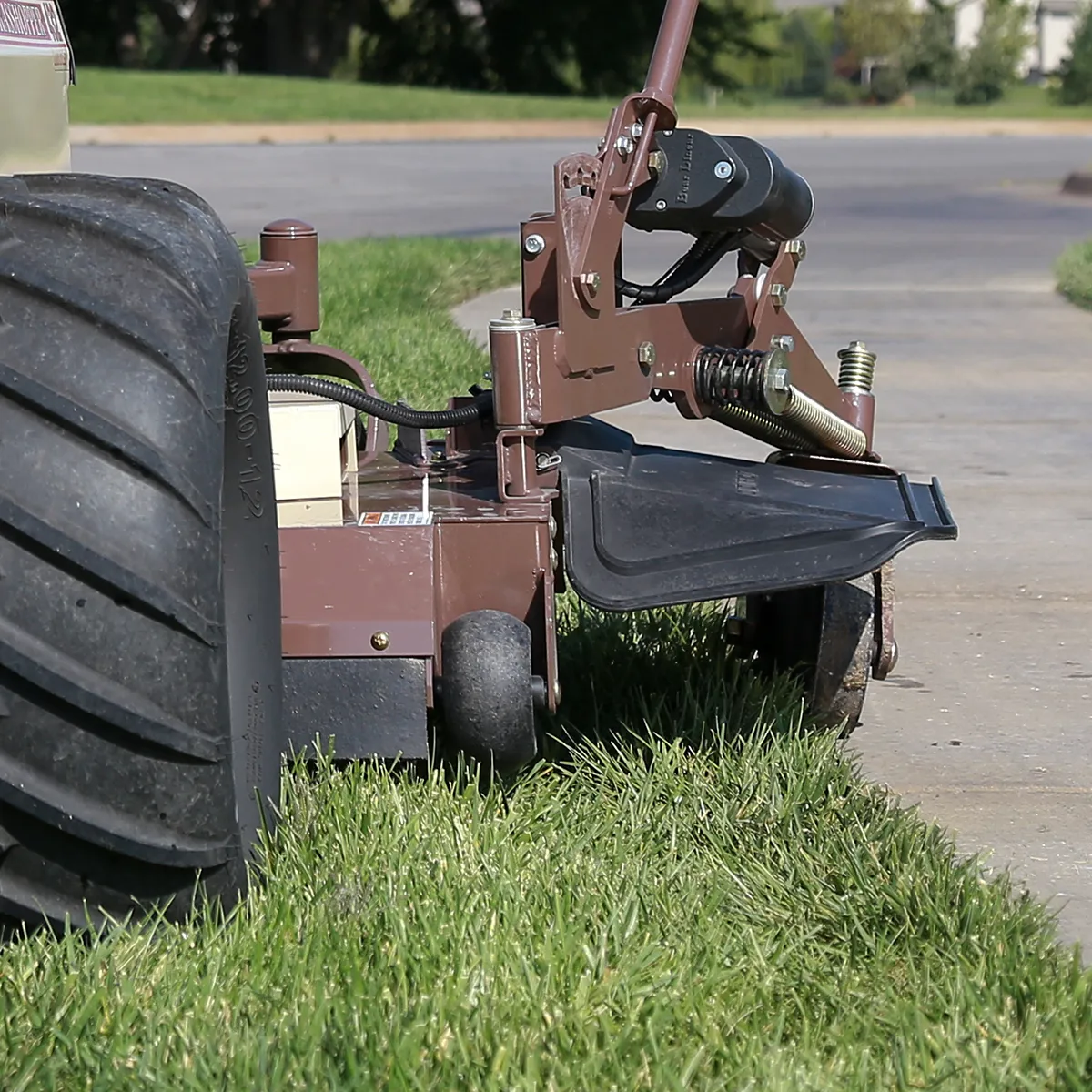 Lawn mower edging attachment grasshopper
