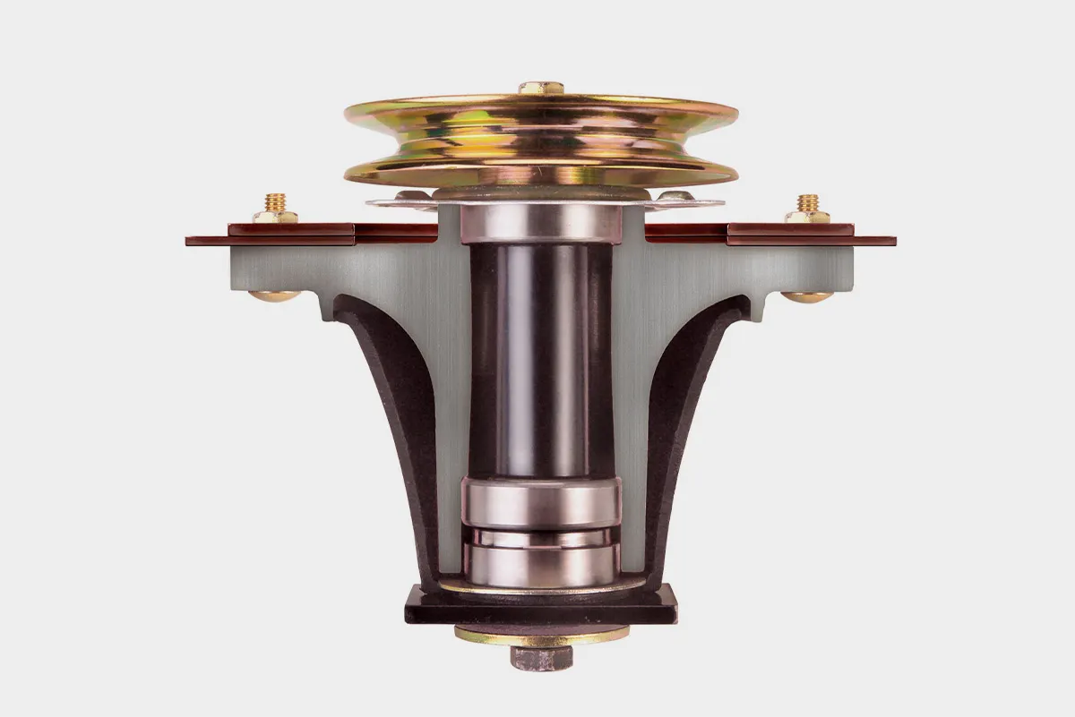 Spindel design is durable and premier on grasshopper lawn mower decks with gray background